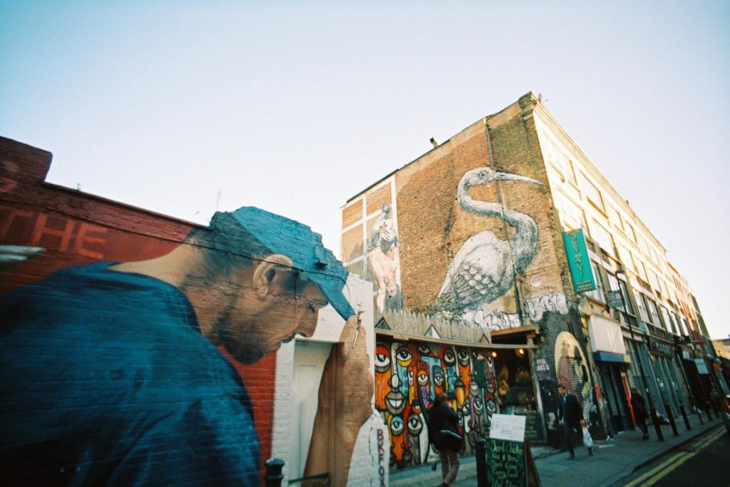 Brick Lane Street Art | Man in blue cap